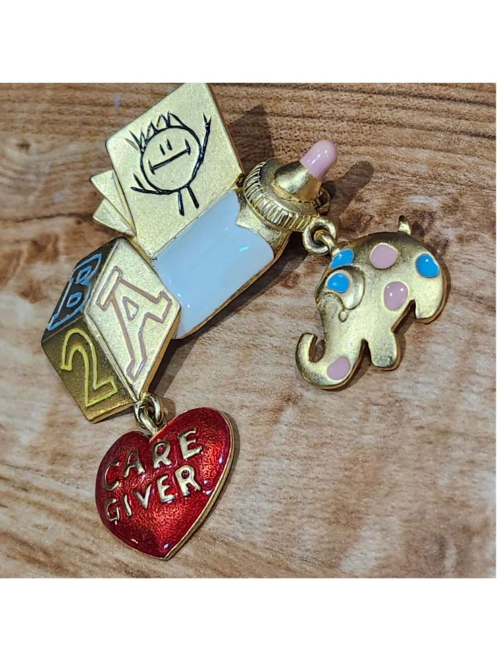 TONA GOLD TONE NANNY INFANT CARE GIVER CHARM BROOCH